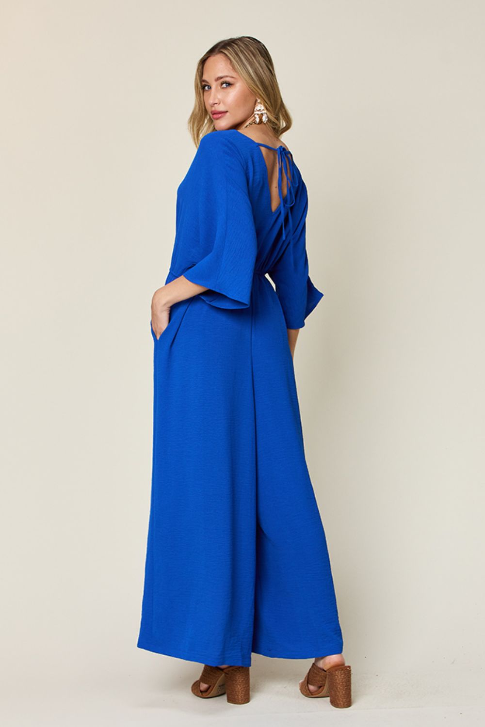 Full Size Surplice Wide Leg Jumpsuit with Pockets - SharpDuds