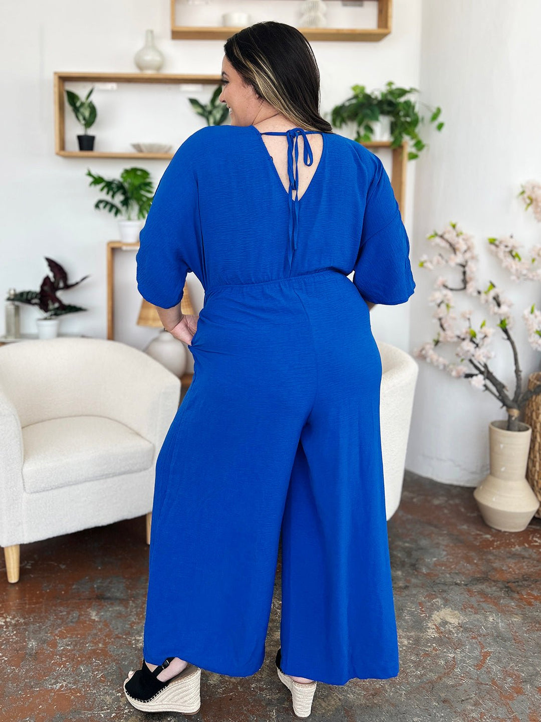 Full Size Surplice Wide Leg Jumpsuit with Pockets - SharpDuds