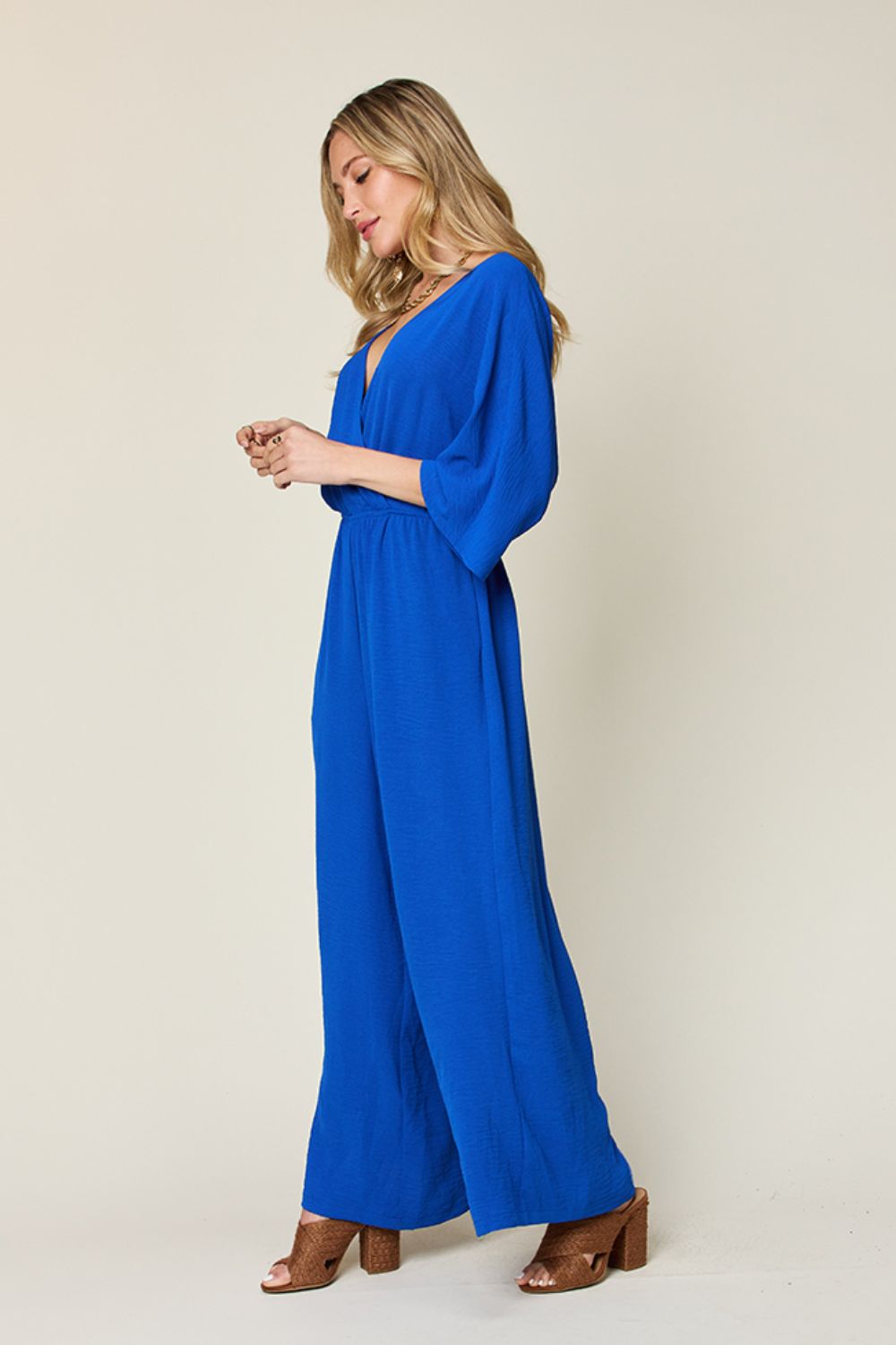 Full Size Surplice Wide Leg Jumpsuit with Pockets - SharpDuds