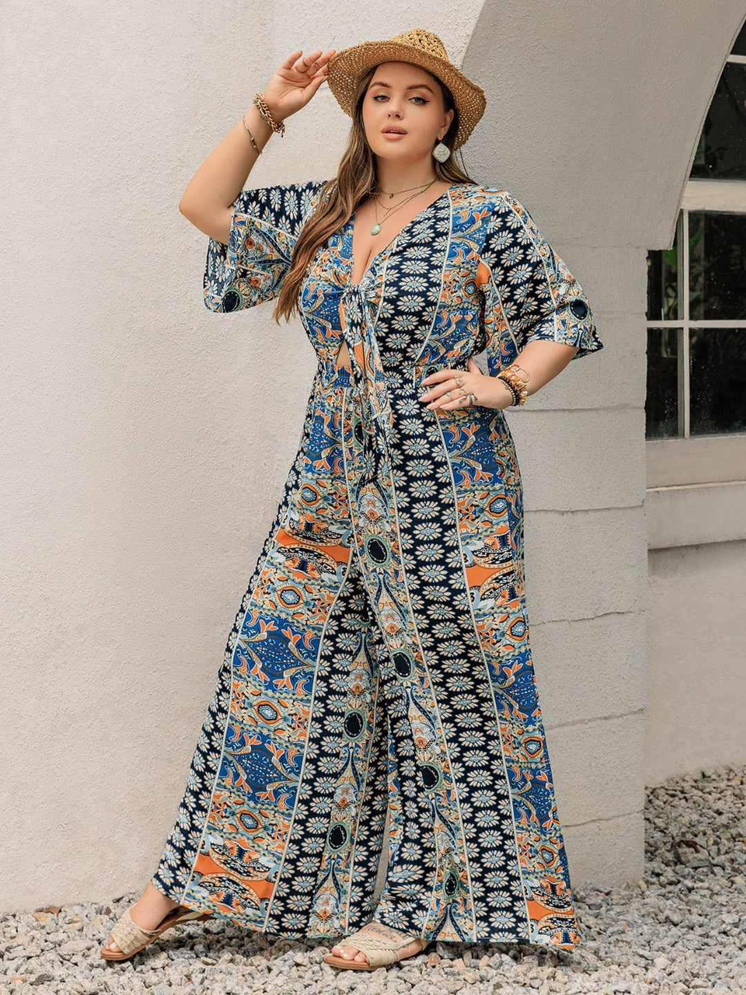 Plus Size Printed Half Sleeve Wide Leg Jumpsuit - SharpDuds