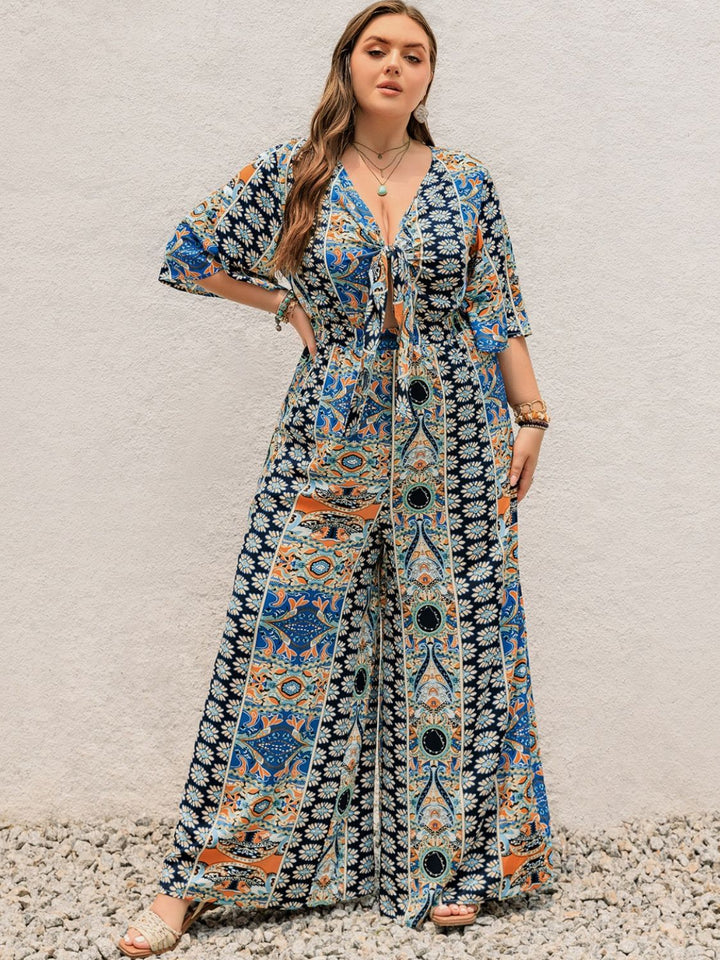 Plus Size Printed Half Sleeve Wide Leg Jumpsuit - SharpDuds